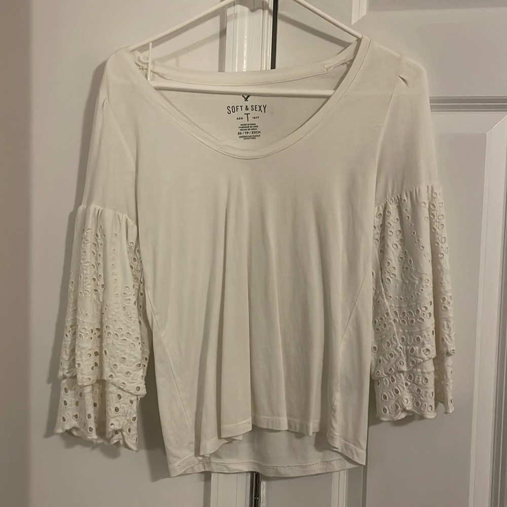 Eyelet bell sleeve top